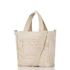 Areca Crossbody Latte on Sandstone