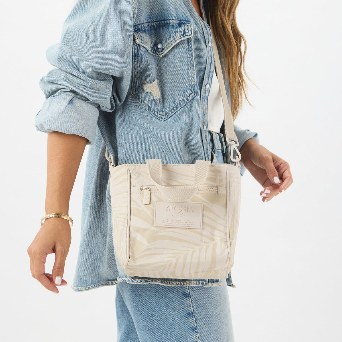 Areca Crossbody Latte on Sandstone