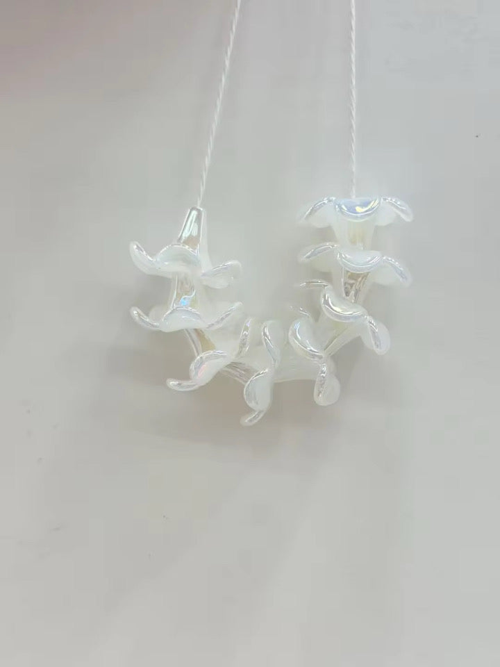 Make Your Own Puakenikeni Lei Pearl White