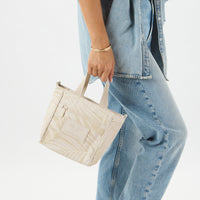Areca Crossbody Latte on Sandstone