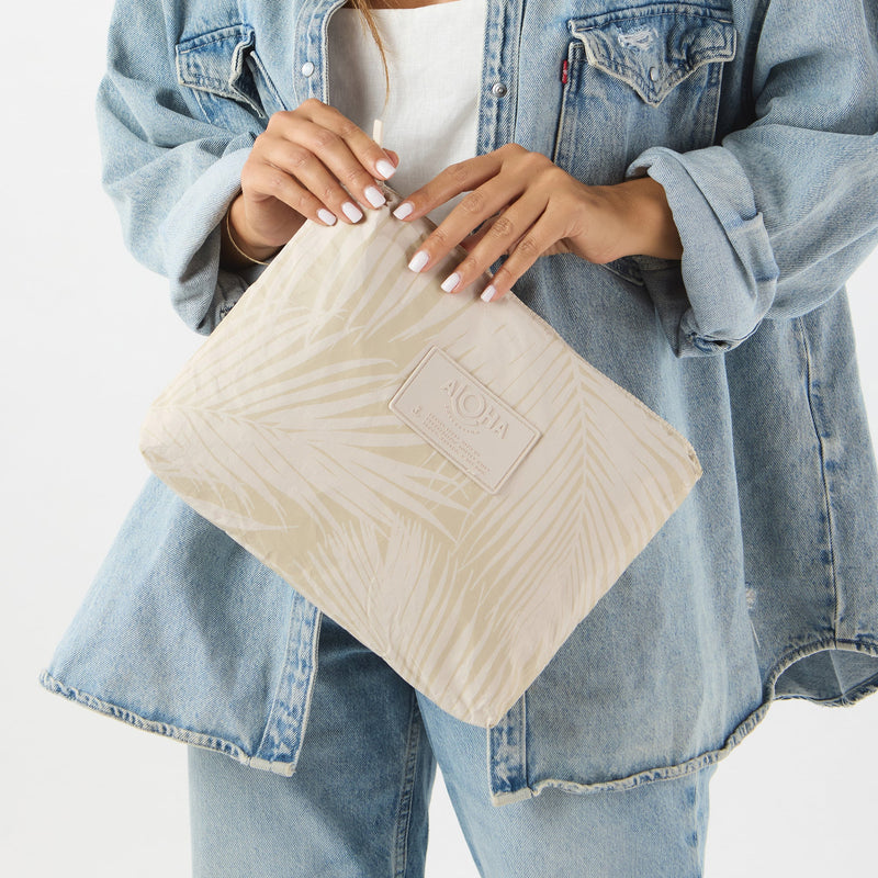 Areca Mid Pouch Latte on Sandstone